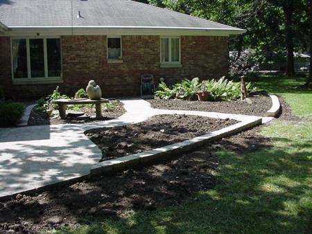 Winding Hessit Paver Sidewalk through Garden